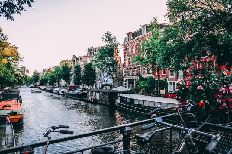 amsterdam canal houses netherlands bicycles