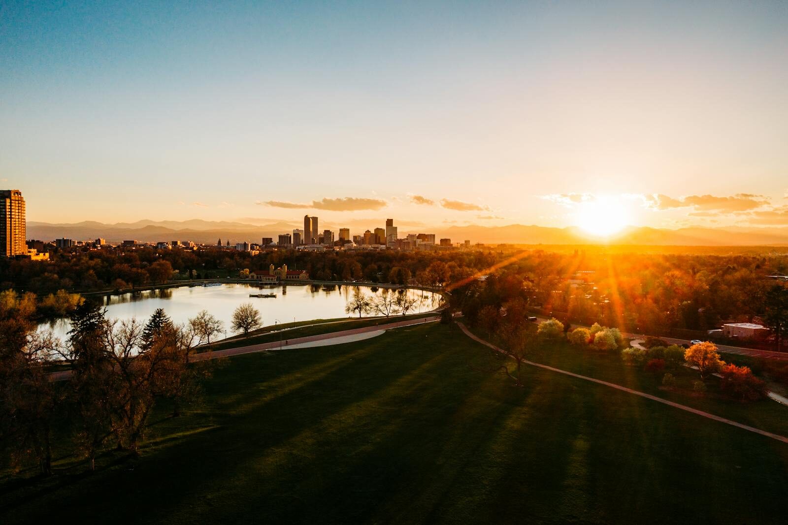 Denver Colorado city neighborhoods with the Rocky Mountains visible on a sunny day