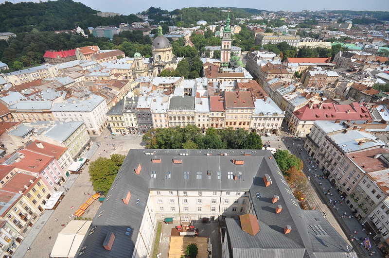 A historic square surrounded by old architecture in Europe