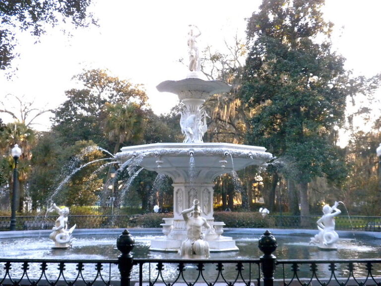 Historic Forsyth Park fountain framed by live oaks in Savannah Georgia