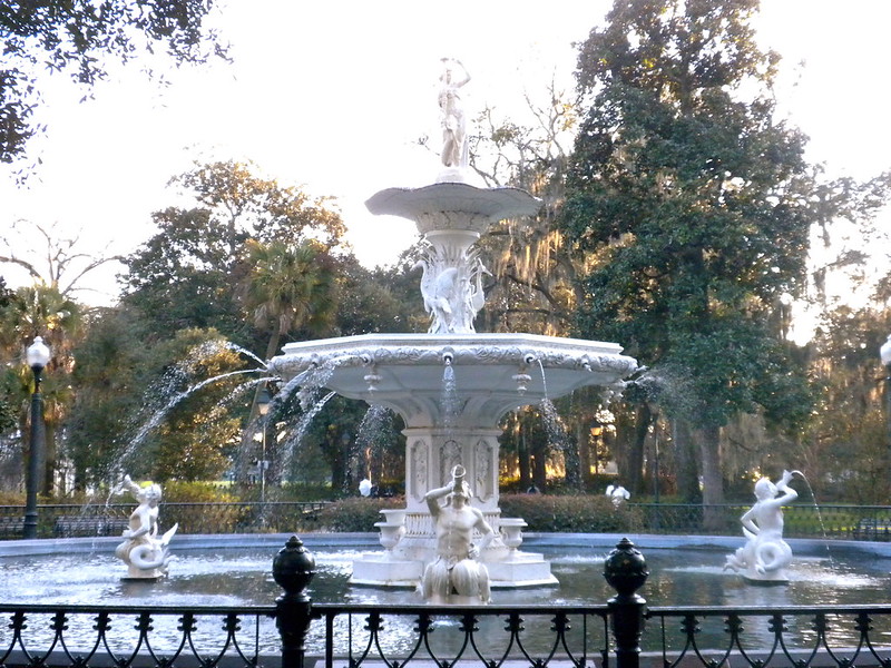 Historic Forsyth Park fountain framed by live oaks in Savannah Georgia