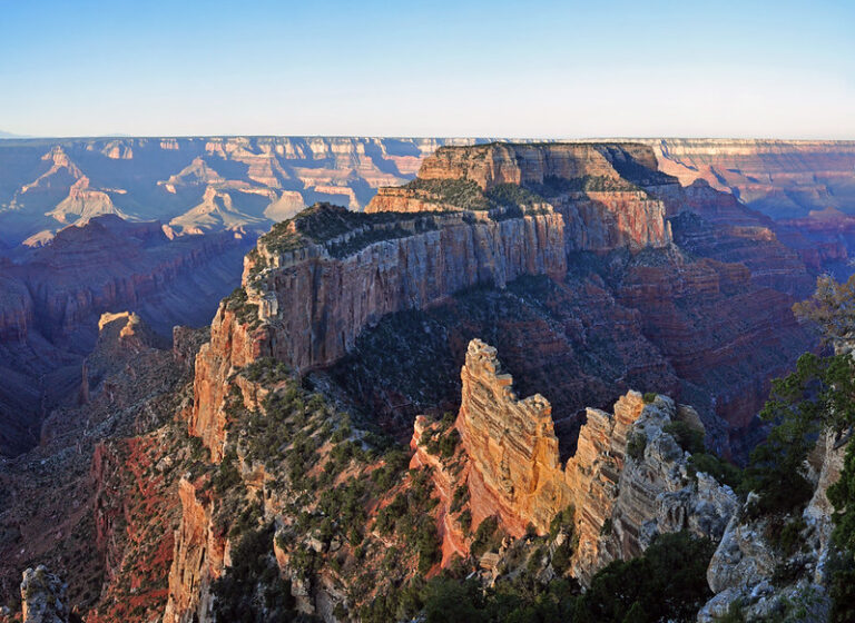 Grand Canyon South Rim glowing at sunset over the canyon