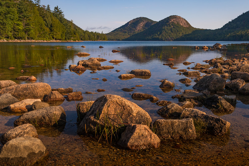 Calm water of Jordan Pond below the Bubbles in Acadia National Park
