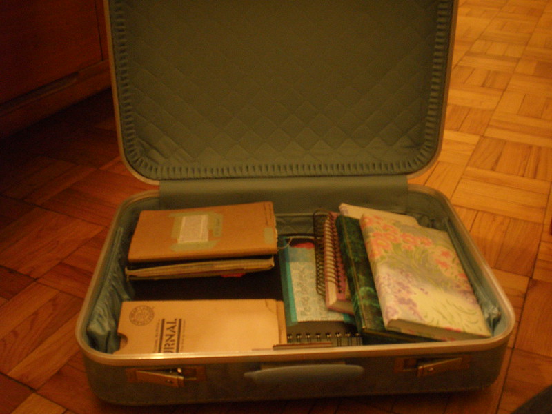 An open suitcase being packed for a trip
