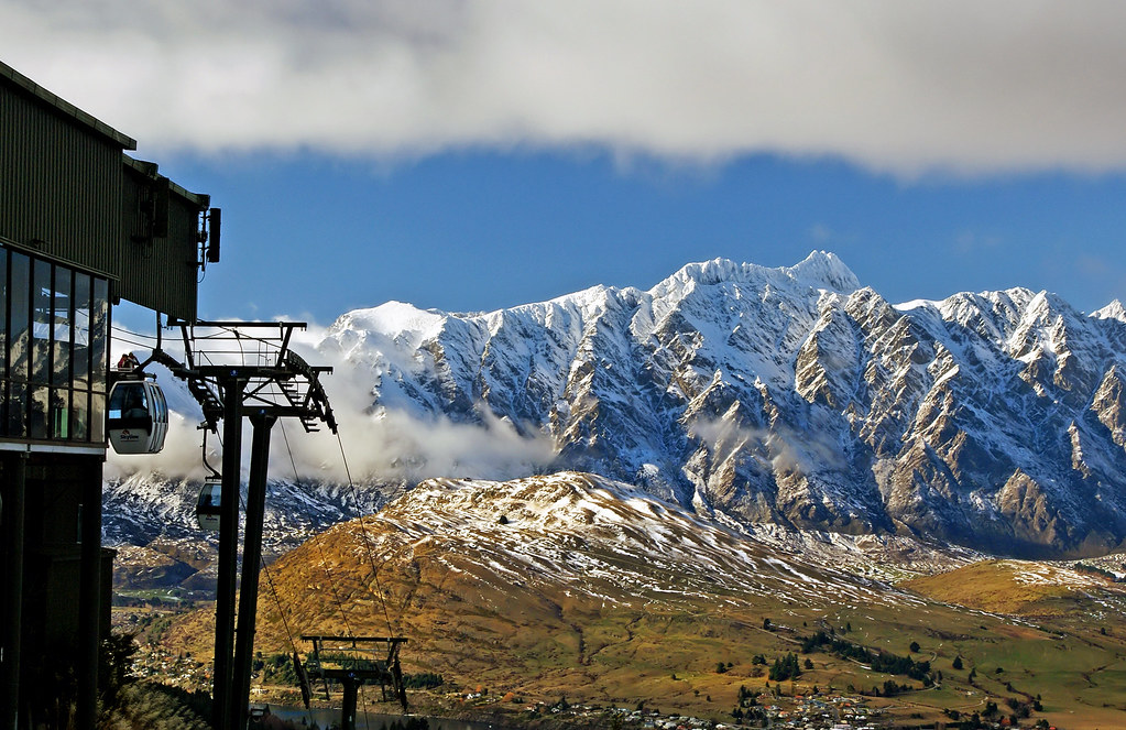 Queenstown New Zealand in winter with Lake Wakatipu and snow-capped Remarkables mountains