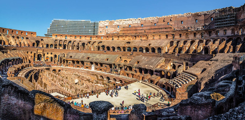 The Roman Colosseum lit at golden hour, a highlight of many European trips