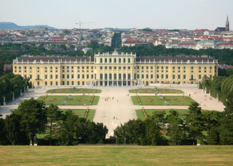 Schönbrunn Palace baroque facade with golden trim in Vienna Austria