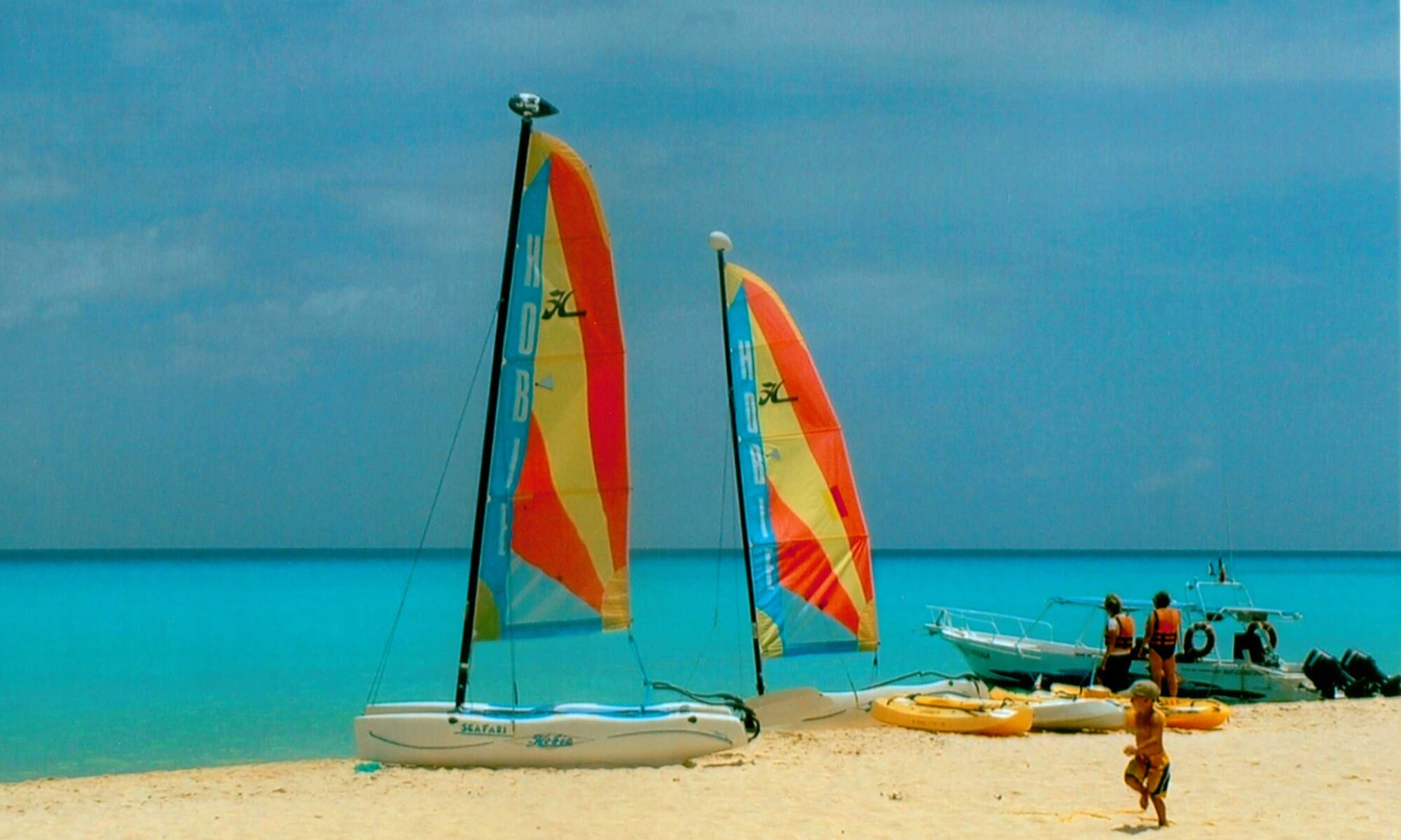 Turquoise Caribbean water and white sand beach at Playa del Carmen Mexico