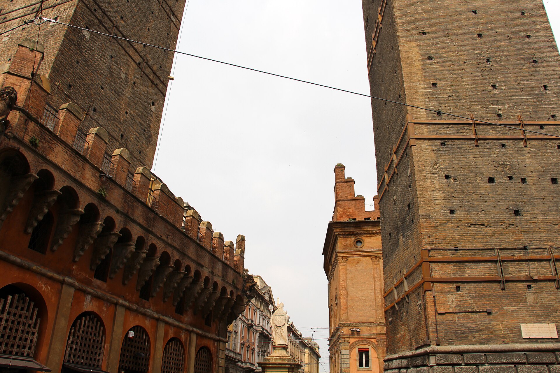 Bologna's leaning medieval Two Towers, Asinelli and Garisenda, against a blue sky