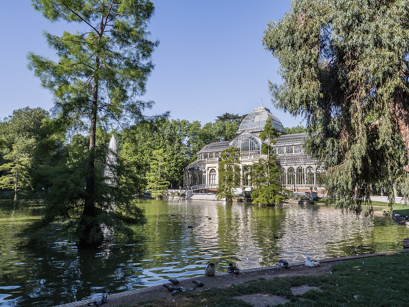 The glass Palacio de Cristal in Madrid Retiro Park