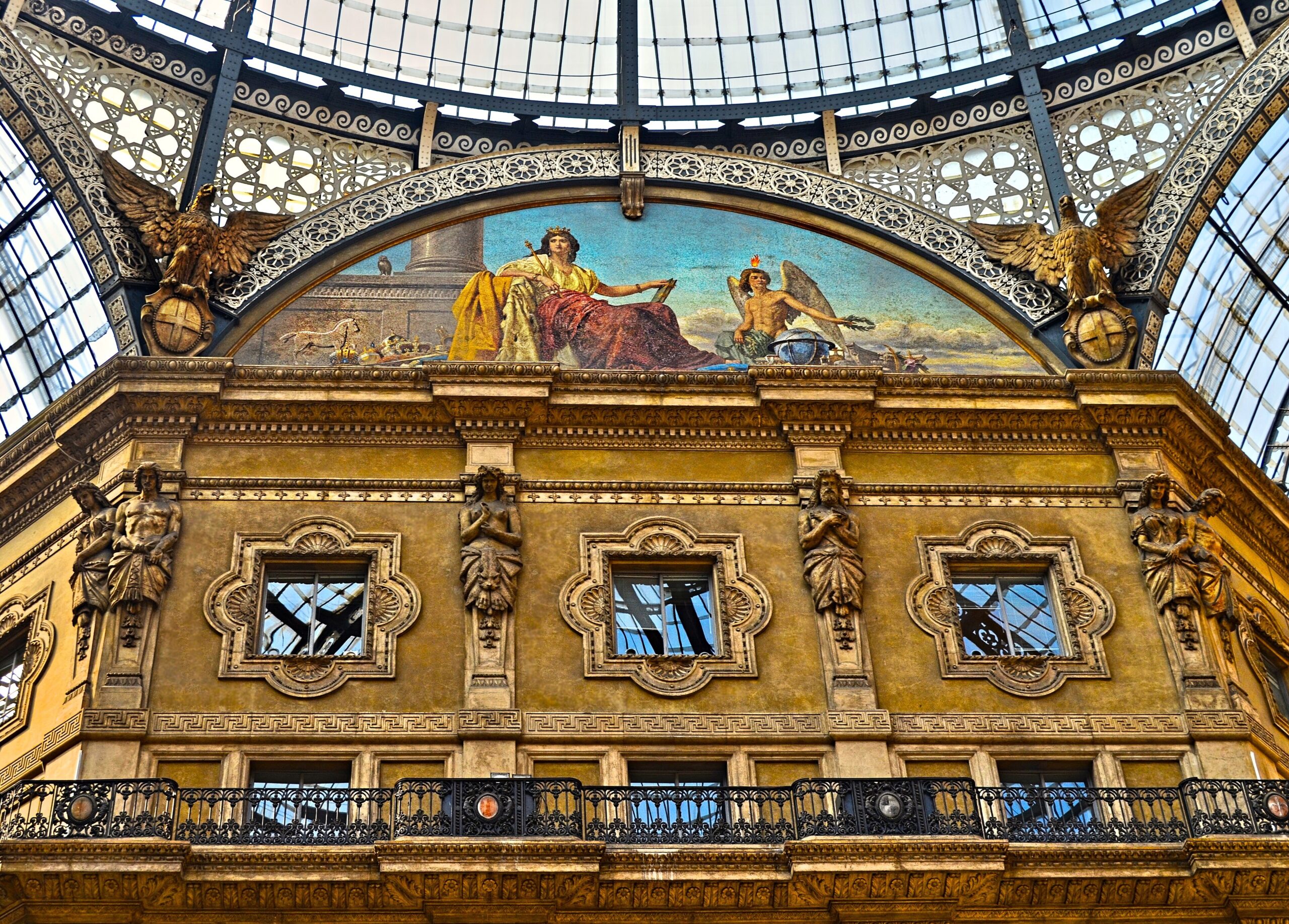 The glass-domed Galleria Vittorio Emanuele II shopping arcade in Milan, Italy