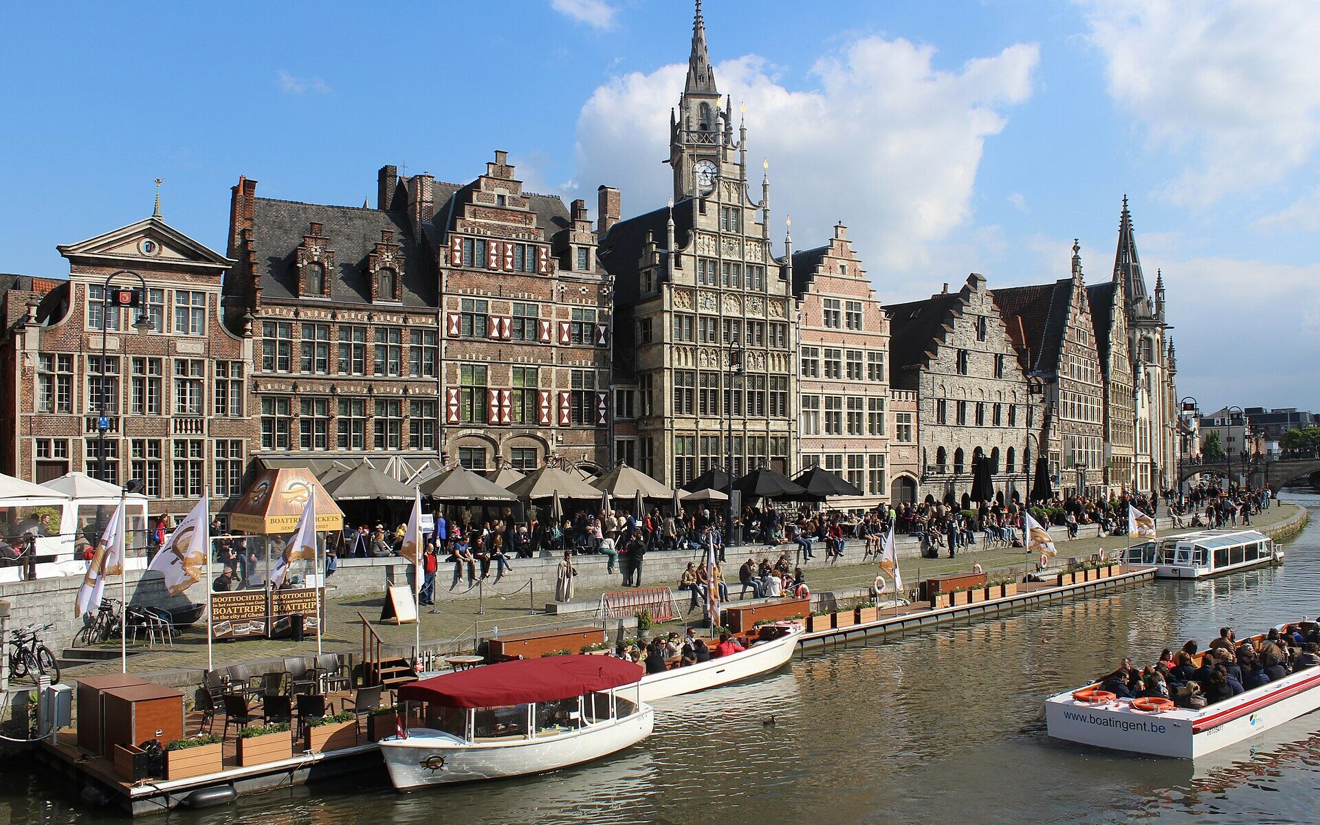 Medieval guild houses lining the Graslei waterfront on the canal in Ghent Belgium
