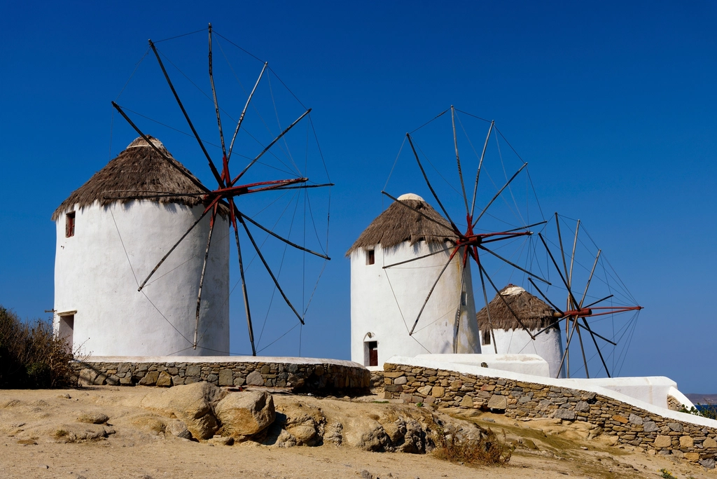 Traditional whitewashed windmills on the Greek island of Mykonos