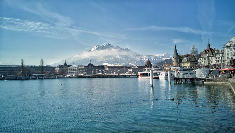 Lake Lucerne with the old town and a snowcapped peak rising behind