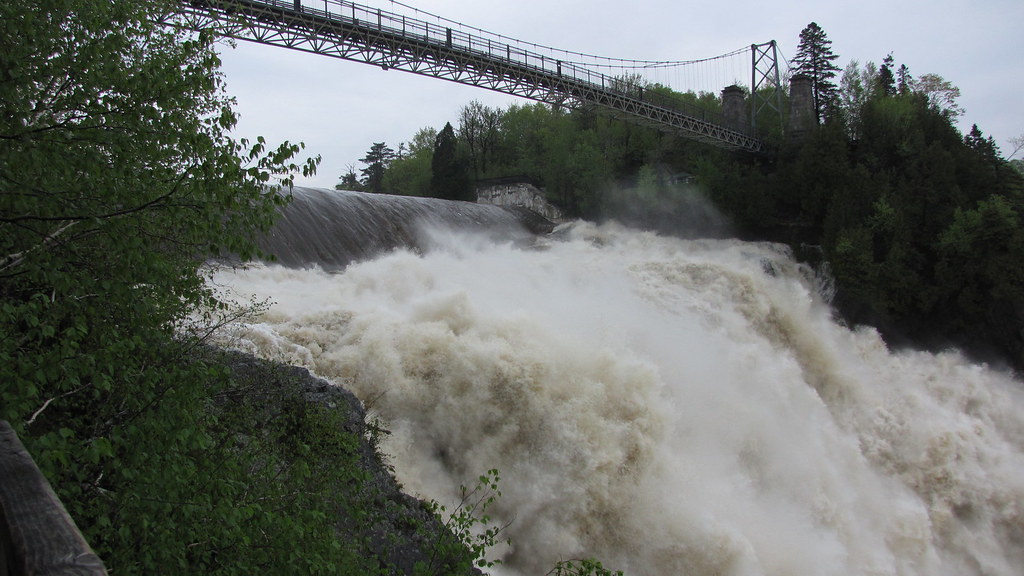 Montmorency Falls plunging beside its suspension bridge near Quebec City