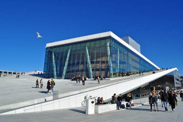 The white marble roof of the Oslo Opera House sloping down into the Oslofjord