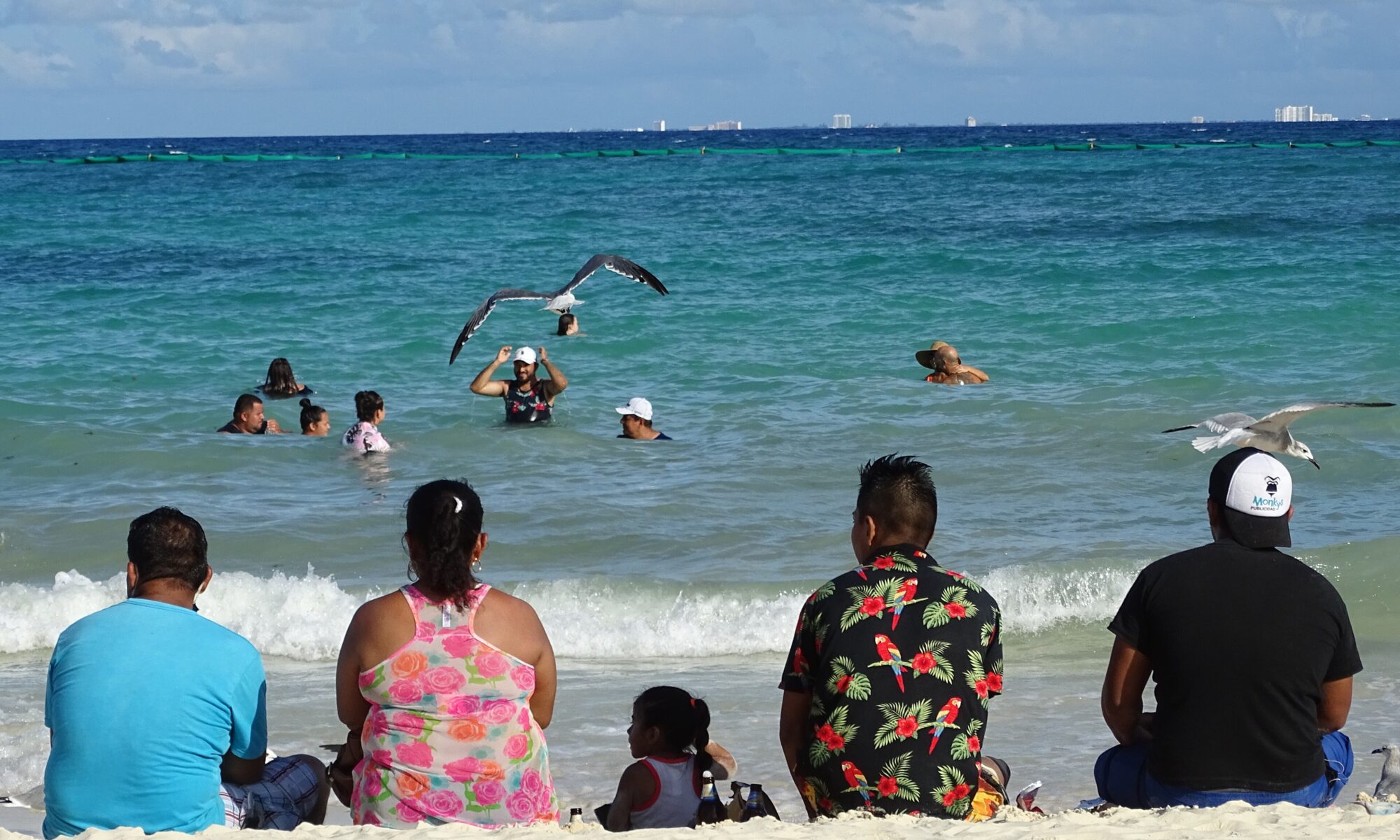 Turquoise Caribbean water and white sand at a Playa del Carmen beach in Mexico
