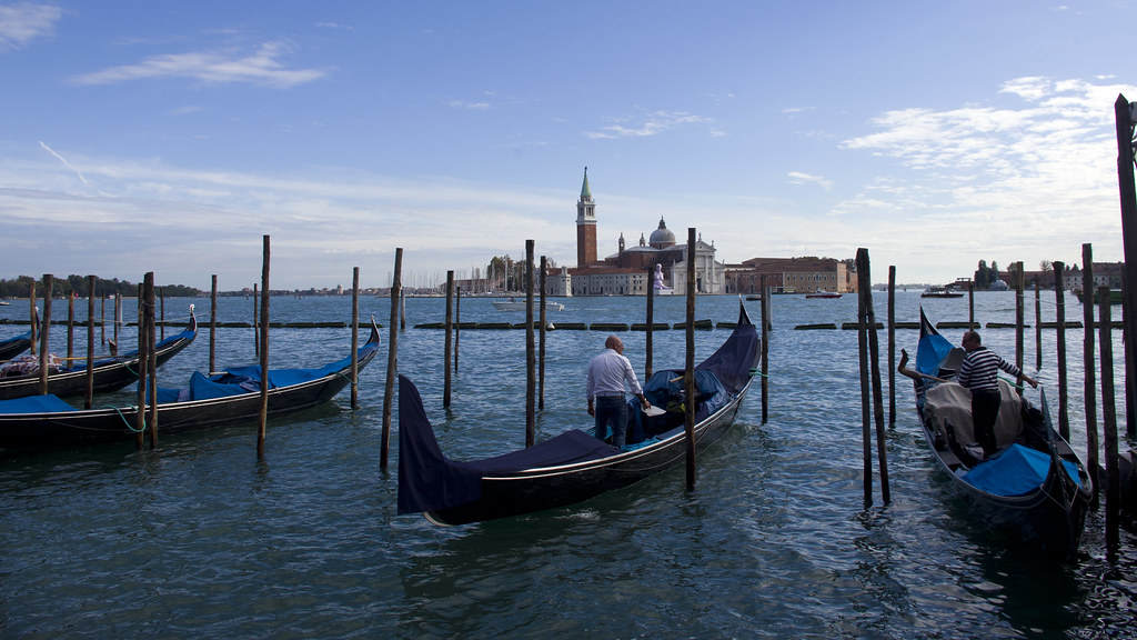 Gondolas moored in Venice with San Giorgio Maggiore across the water