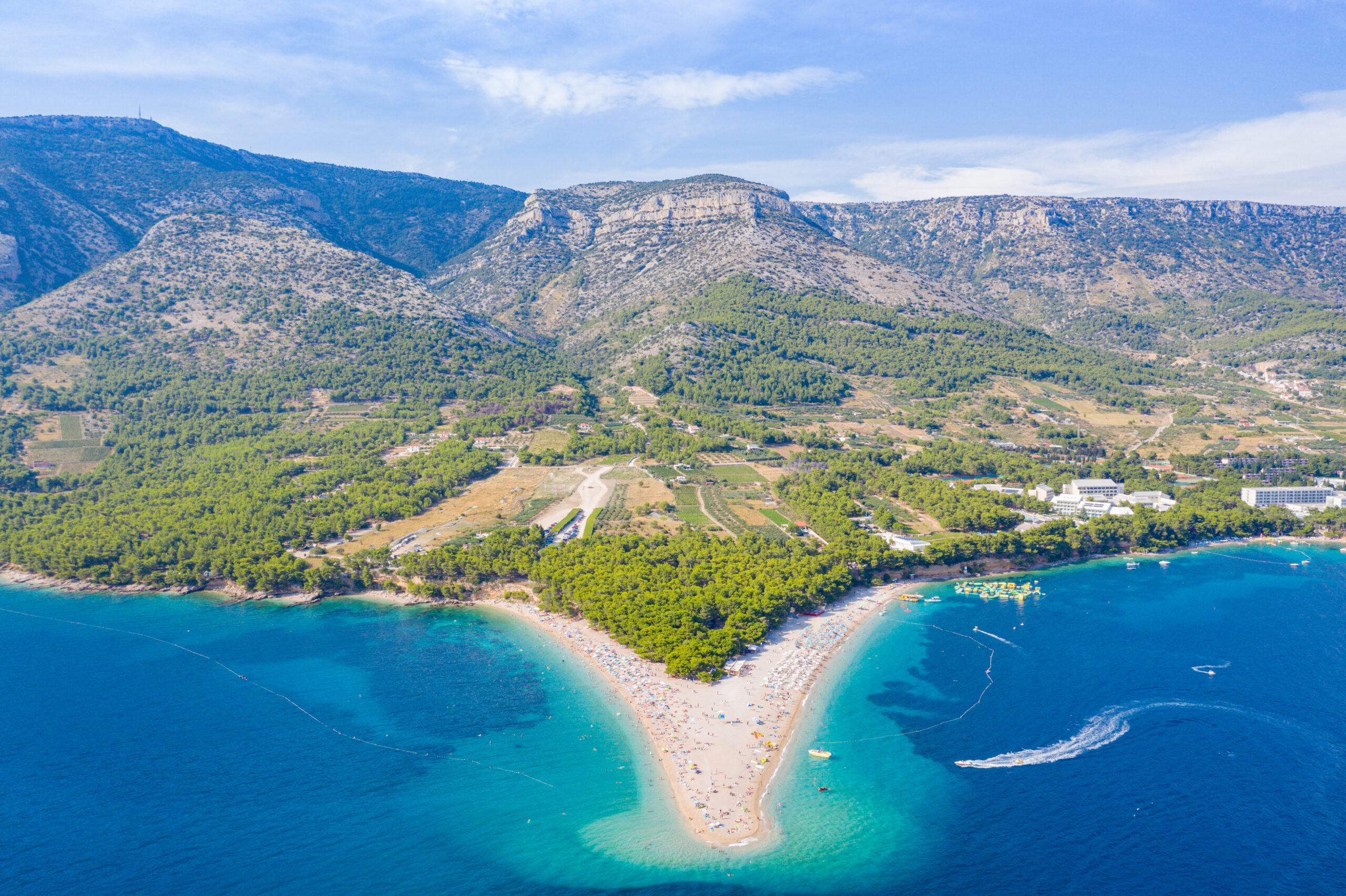 Aerial view of the Zlatni Rat beach spit on Brac island with turquoise Adriatic water
