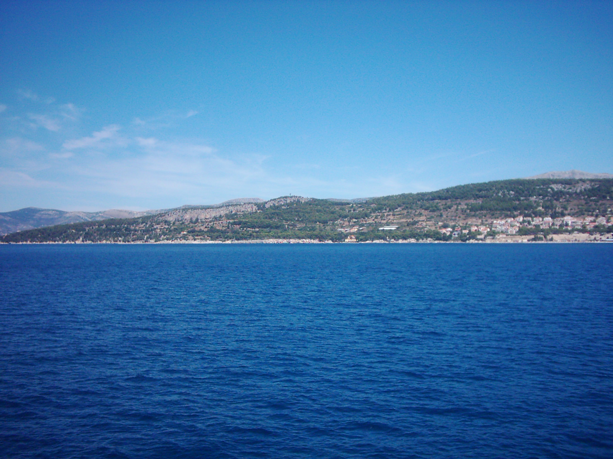 View of the Adriatic Sea and distant Croatian islands from the deck of a ferry