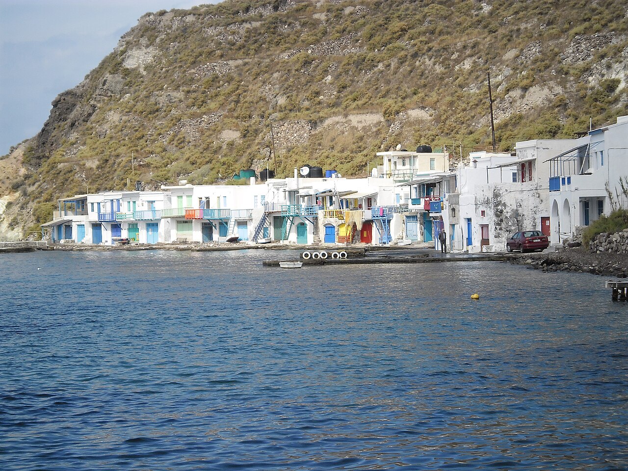 Colorful syrmata boat houses in Klima fishing village on Milos Island, Greece