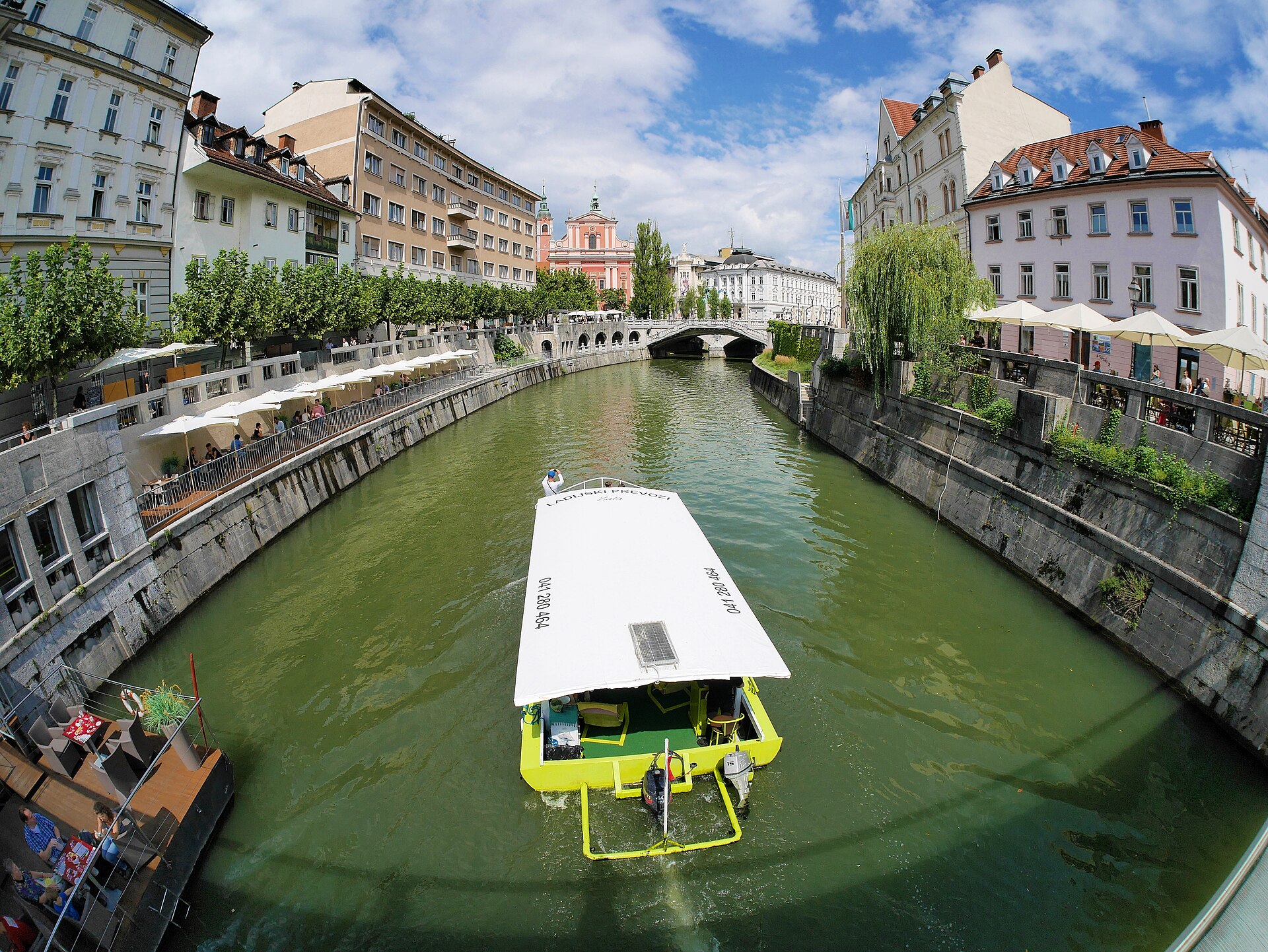 Cafes lining the Ljubljanica river in the old town of Ljubljana