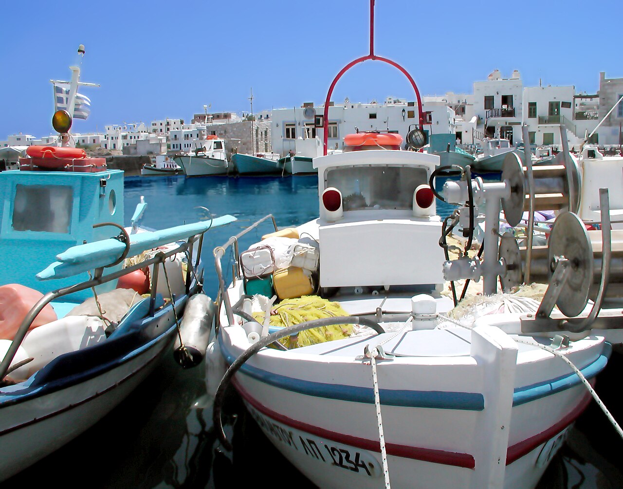 Traditional fishing boats moored in Naoussa harbor on Paros island, Greece