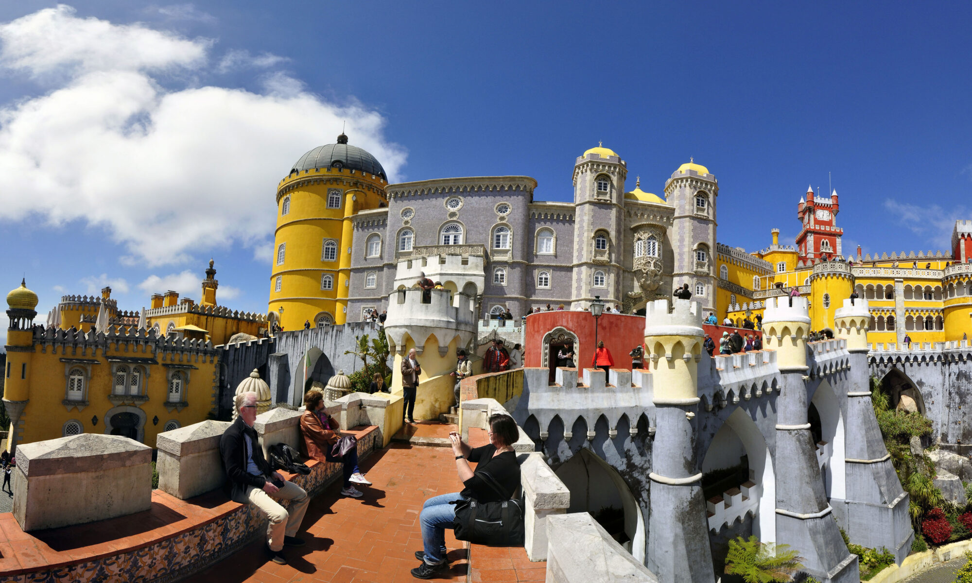 Colorful Pena Palace perched on its hilltop above Sintra, Portugal