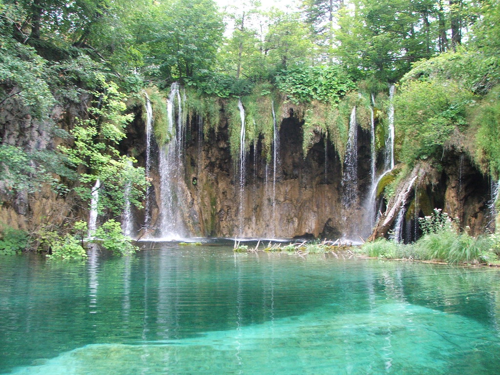 Cascading turquoise waterfalls at Plitvice Lakes National Park in Croatia