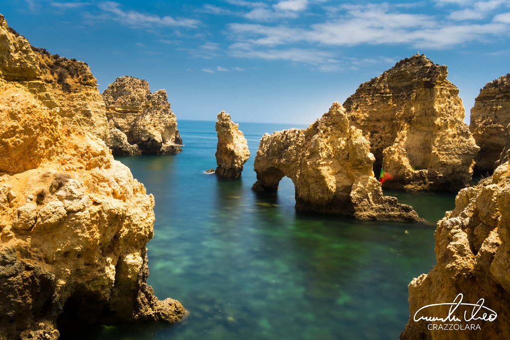 Golden sea stacks and arches at Ponta da Piedade near Lagos, Portugal