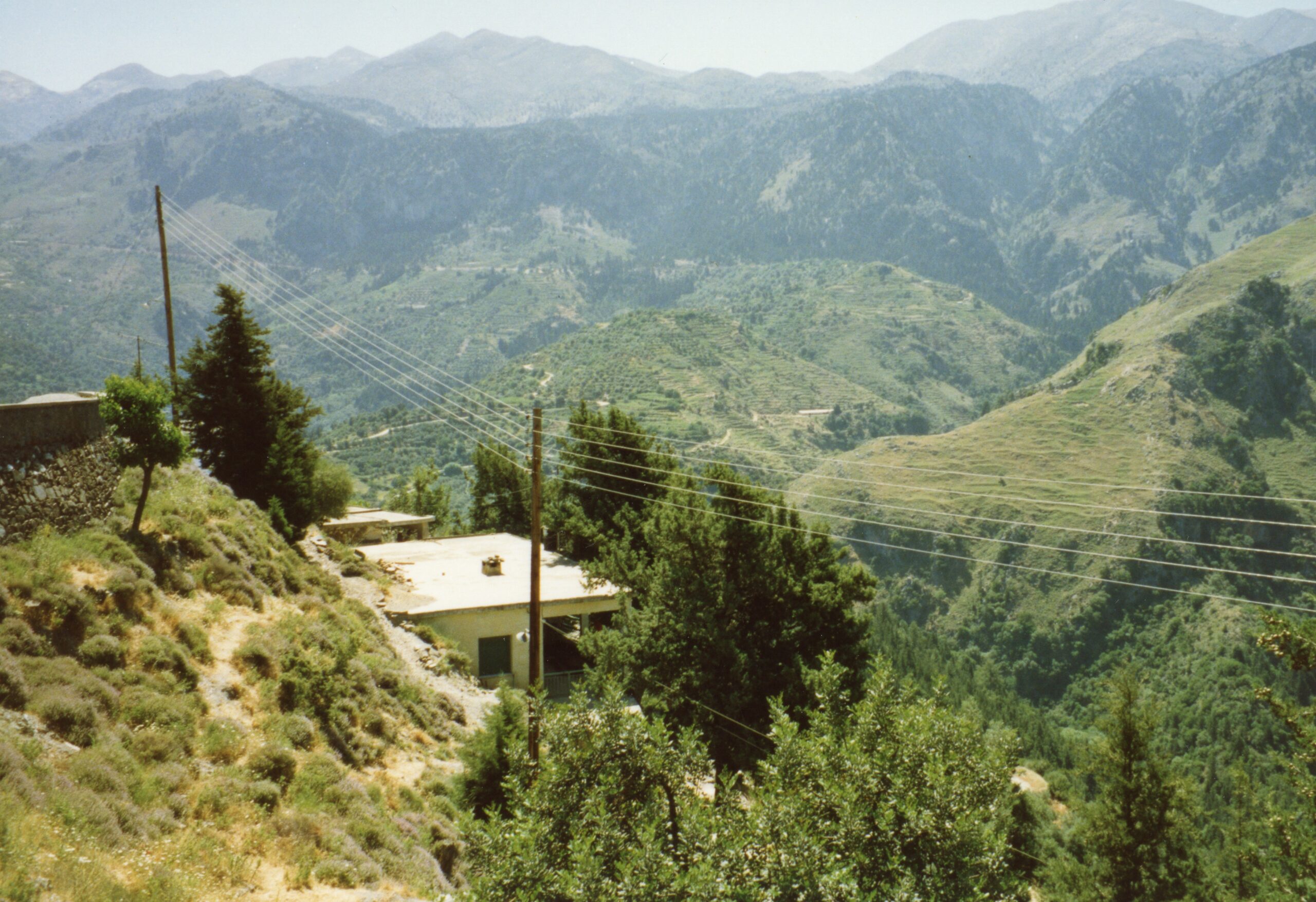 Mountain road winding toward the entrance of the Samaria Gorge in Crete