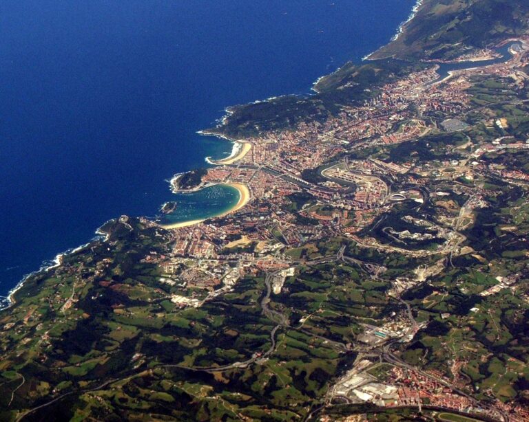 Aerial view of La Concha bay and beach curving around San Sebastian Spain