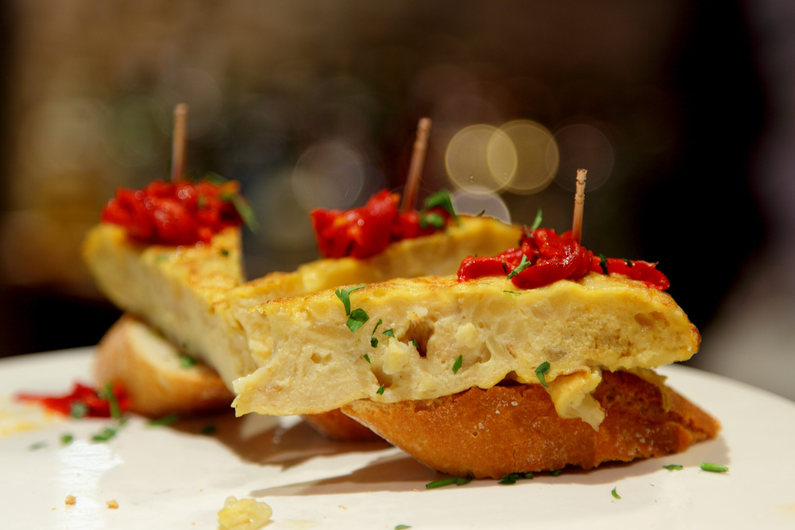Counter of Spanish pintxos and tortilla tapas ready to order