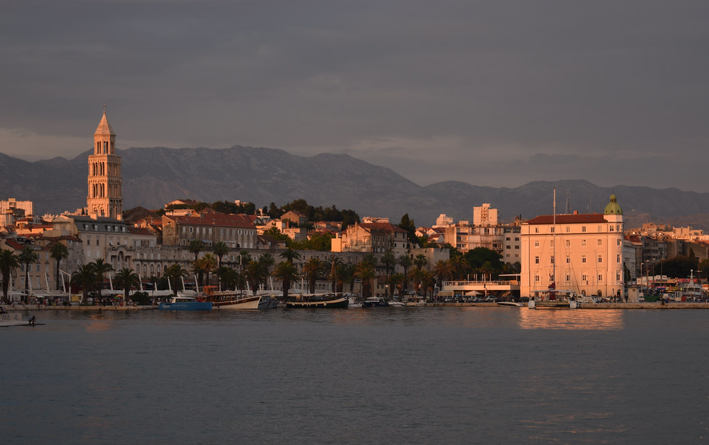 People walking along the Riva waterfront promenade in Split Croatia