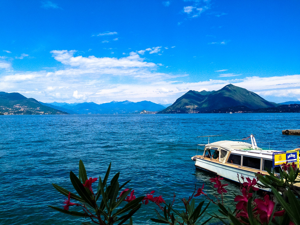 Golden evening light over the ferry dock at Stresa on Lake Maggiore Italy