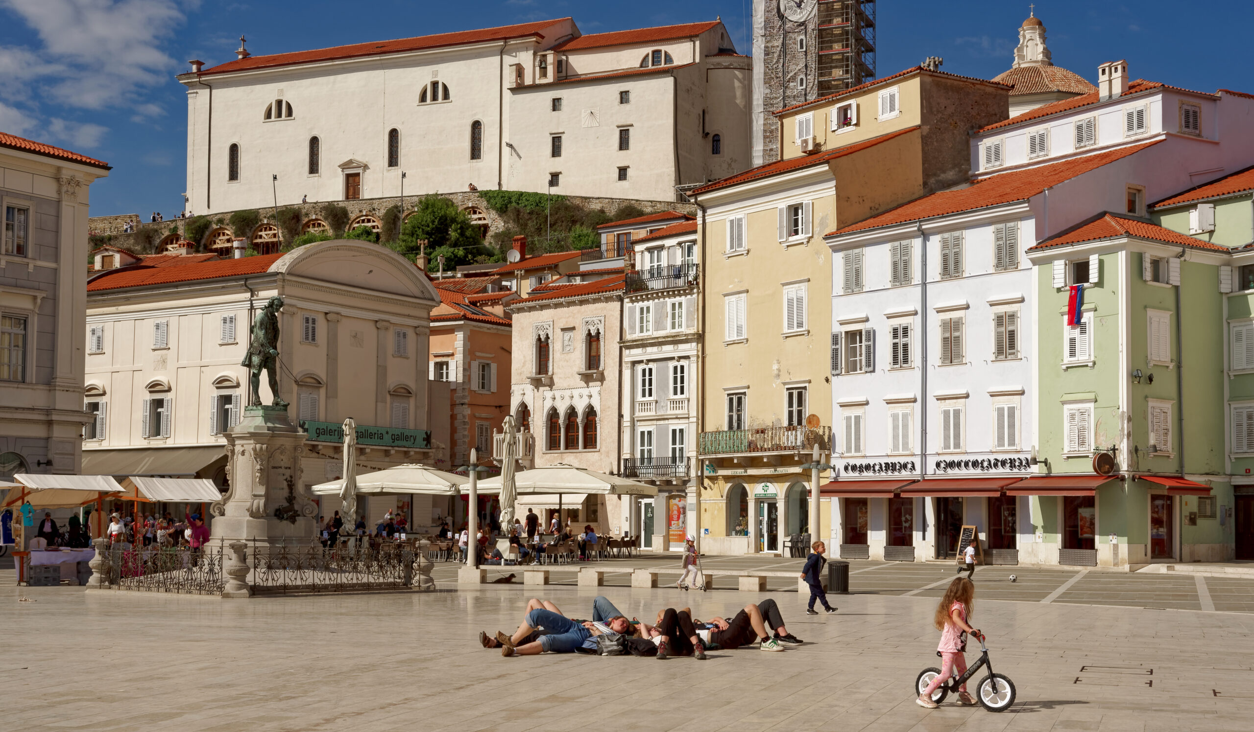 Marble-paved Tartini Square surrounded by Venetian architecture in Piran, Slovenia