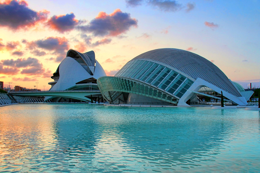 Sunset over the City of Arts and Sciences reflected in its pools in Valencia Spain