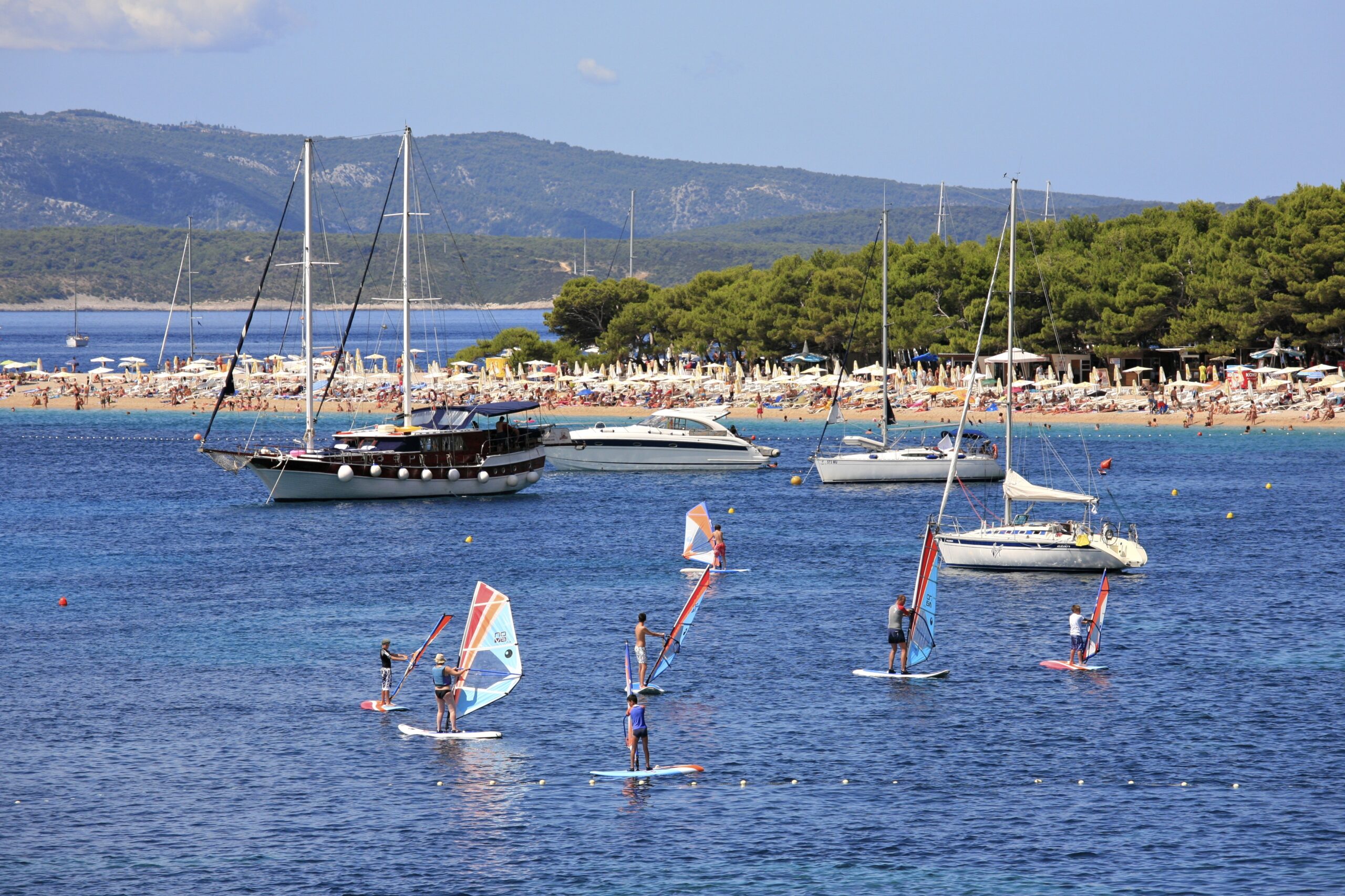 The Zlatni Rat golden horn pebble beach curving into turquoise water on Brac island