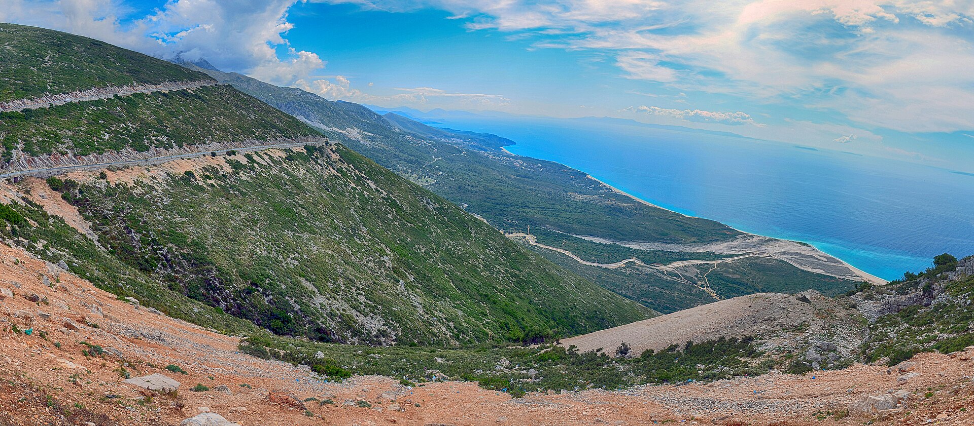 Sweeping view of the Albanian Riviera coastline and Ionian Sea from the Llogara Pass road