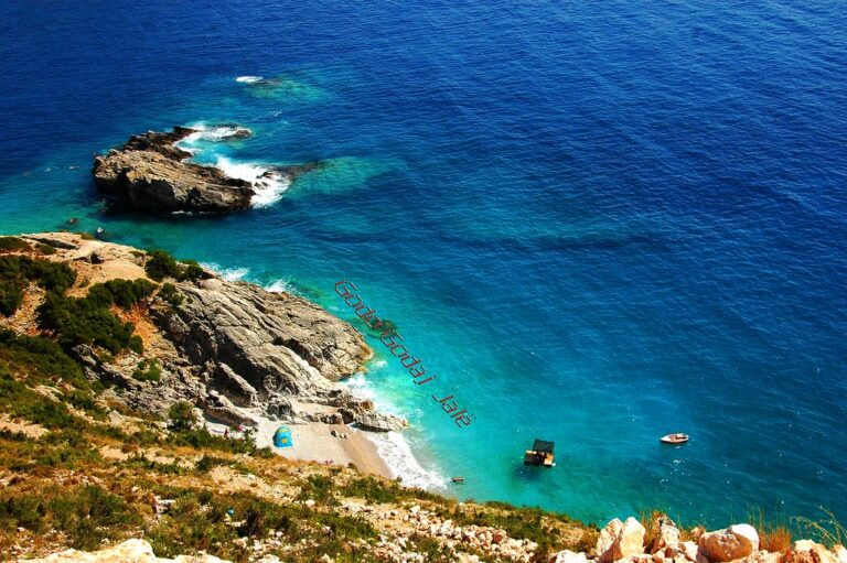 Turquoise sea and rocky cliffs along the Albanian Riviera near Jale