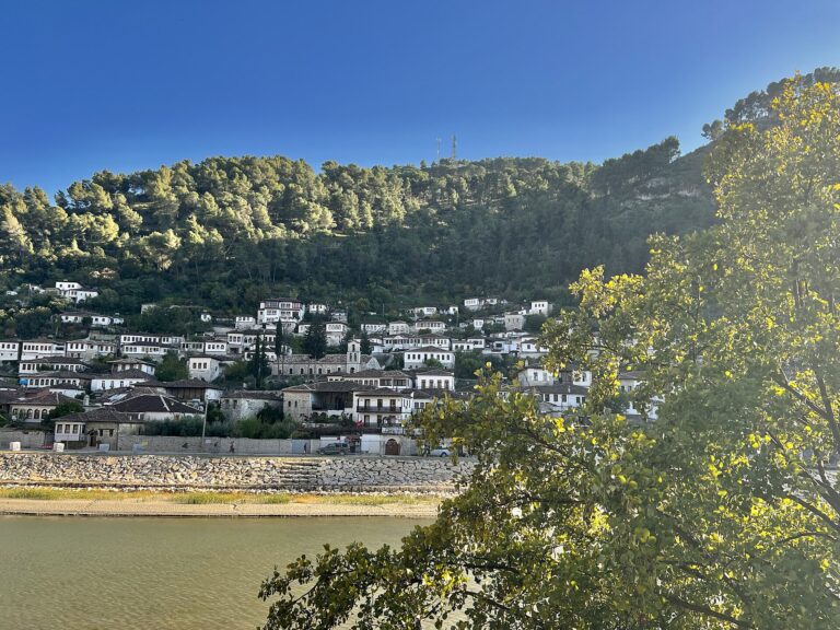 The white Ottoman houses of Berat, Albania, stacked up the hillside above the Osum river