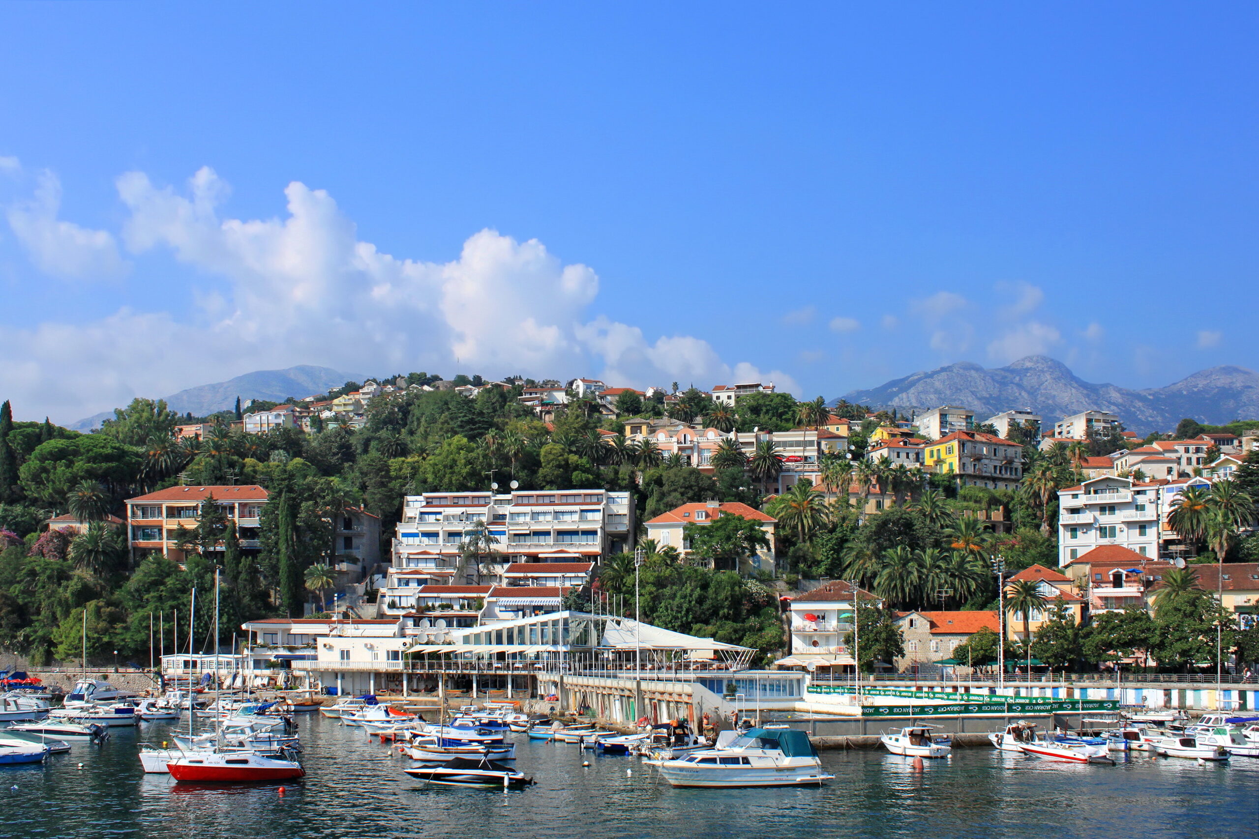 The hillside old town of Herceg Novi rising above its harbour on the Bay of Kotor