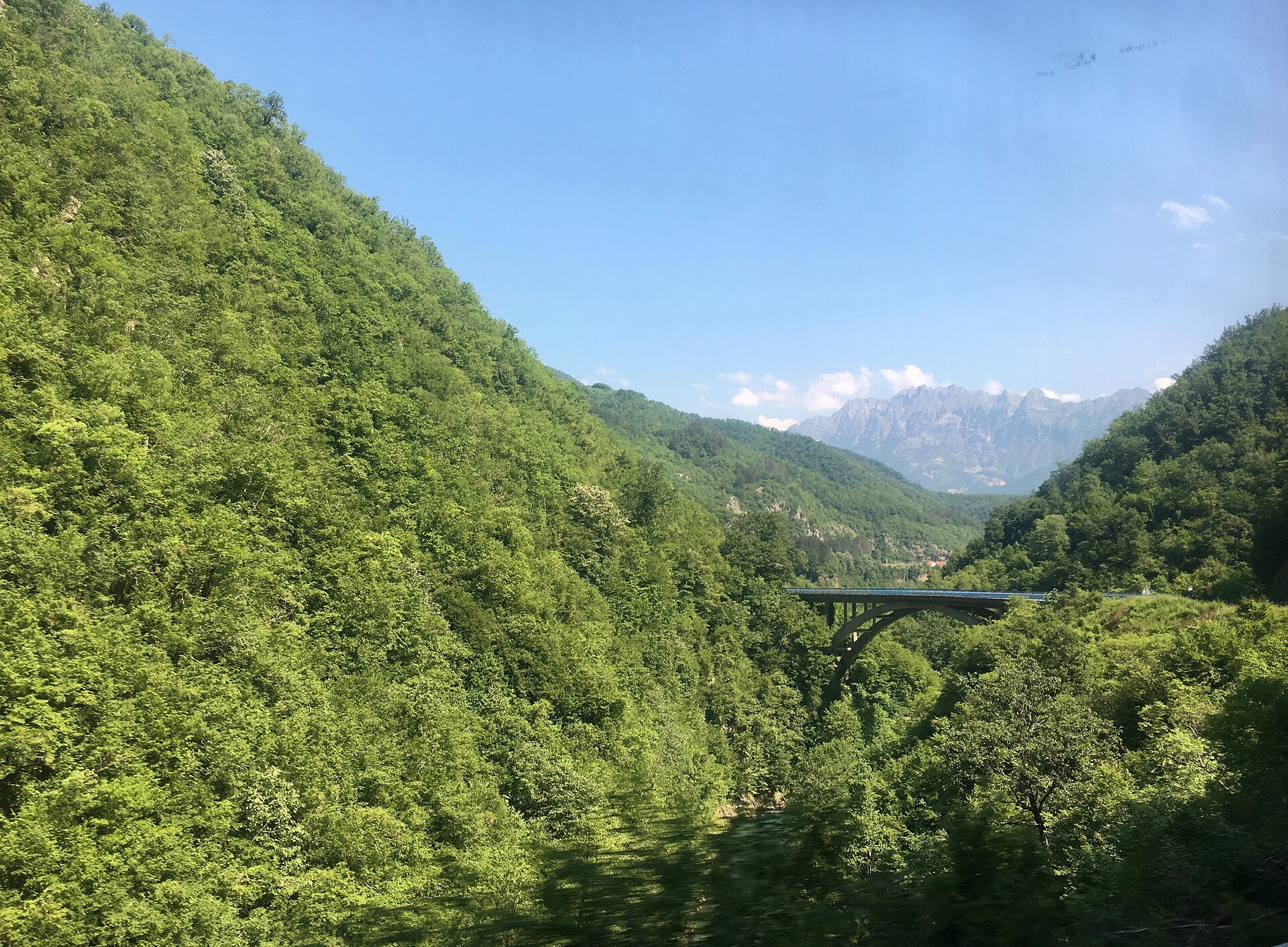 A road winding through the Montenegrin mountains on a ten day road trip route