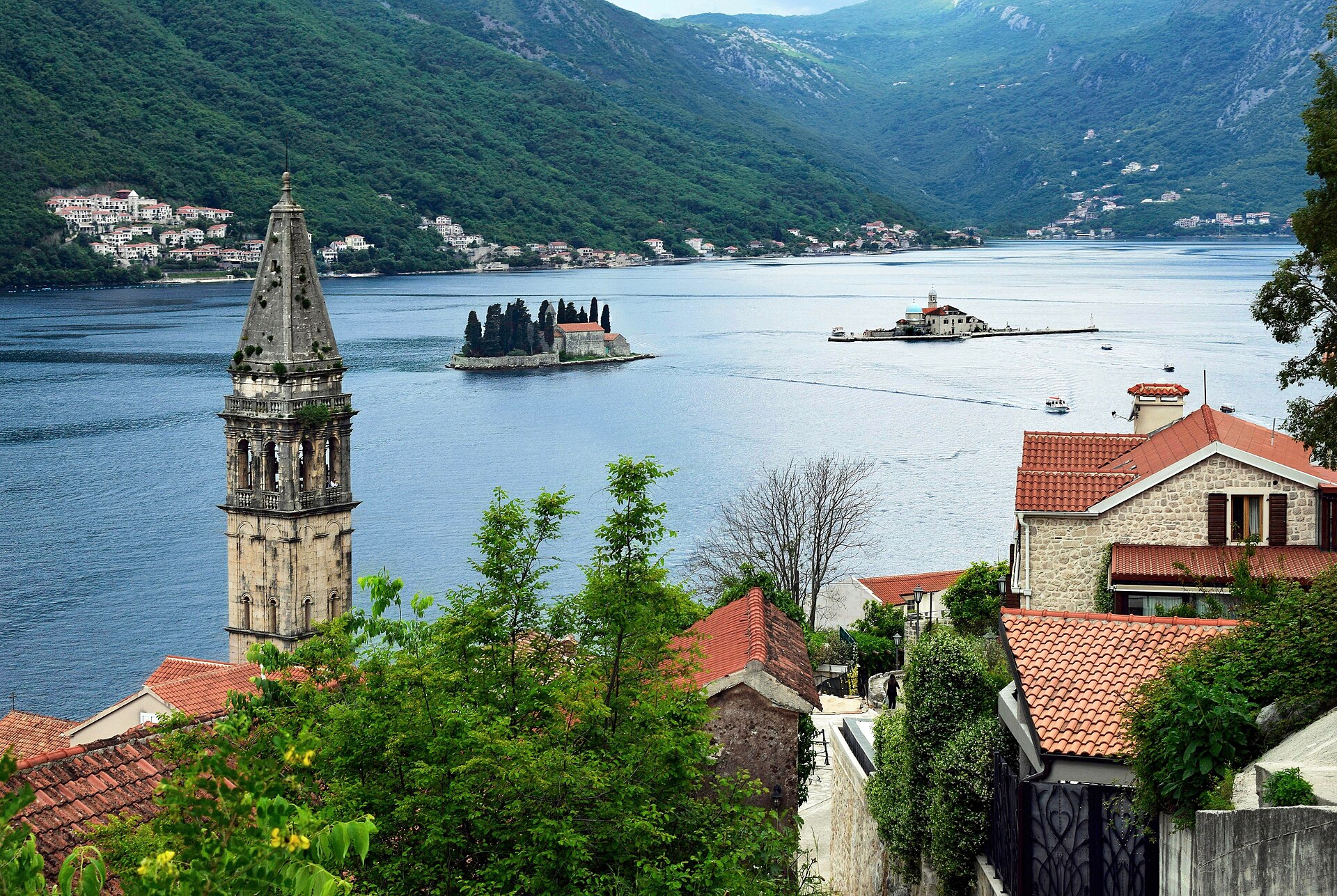 The two islands of Our Lady of the Rocks and St George sitting in the bay off Perast