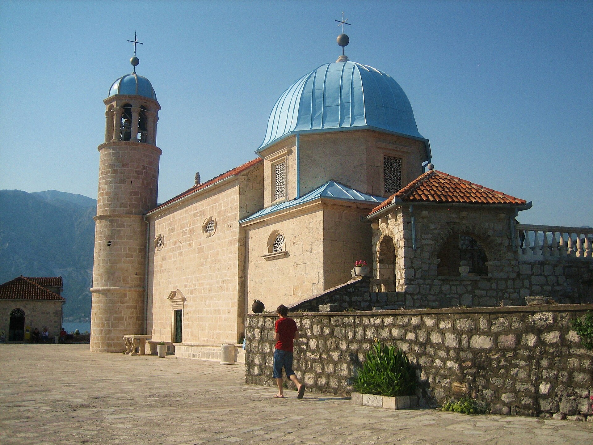 The domed church of Our Lady of the Rocks on its man-made island near Perast