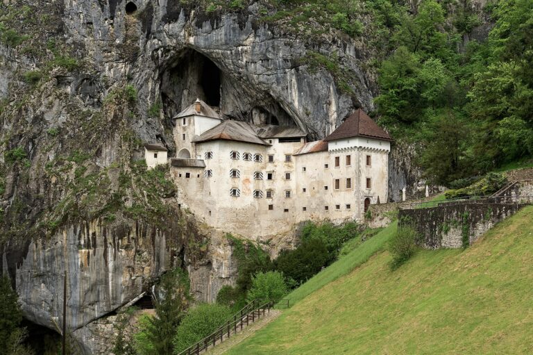 Predjama Castle set into the mouth of a limestone cliff cave in Slovenia