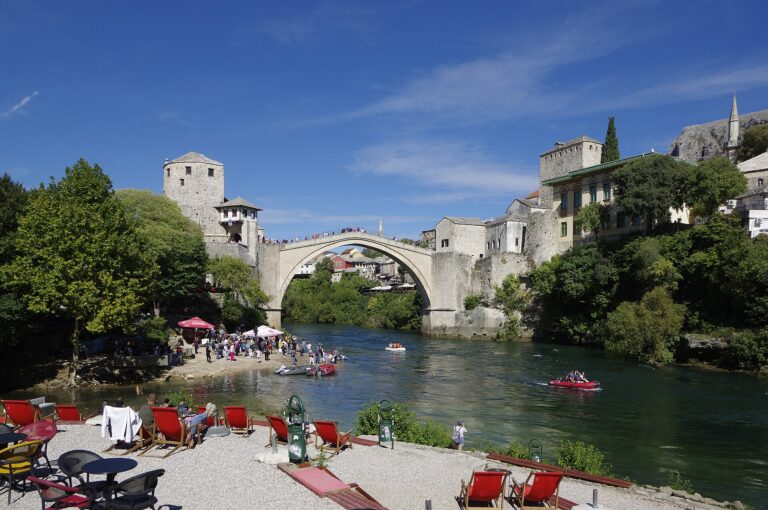 The restored Stari Most Ottoman bridge arching over the green Neretva river in Mostar, Bosnia and Herzegovina