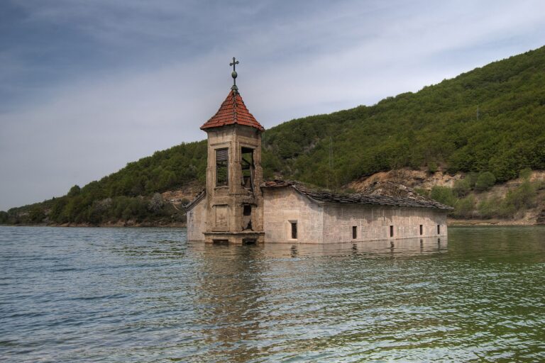 The half-submerged Church of St. Nicholas in Mavrovo Lake, one of the top sights on a trip to North Macedonia