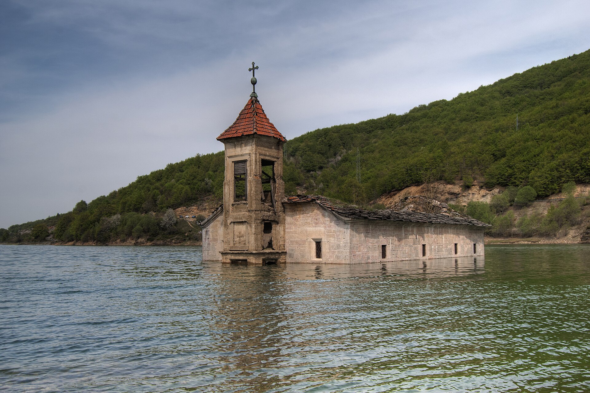 The half-submerged Church of St. Nicholas in Mavrovo Lake, one of the top sights on a trip to North Macedonia