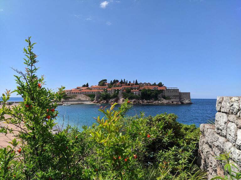 The fortified island of Sveti Stefan linked to the Montenegrin coast by a narrow sand causeway